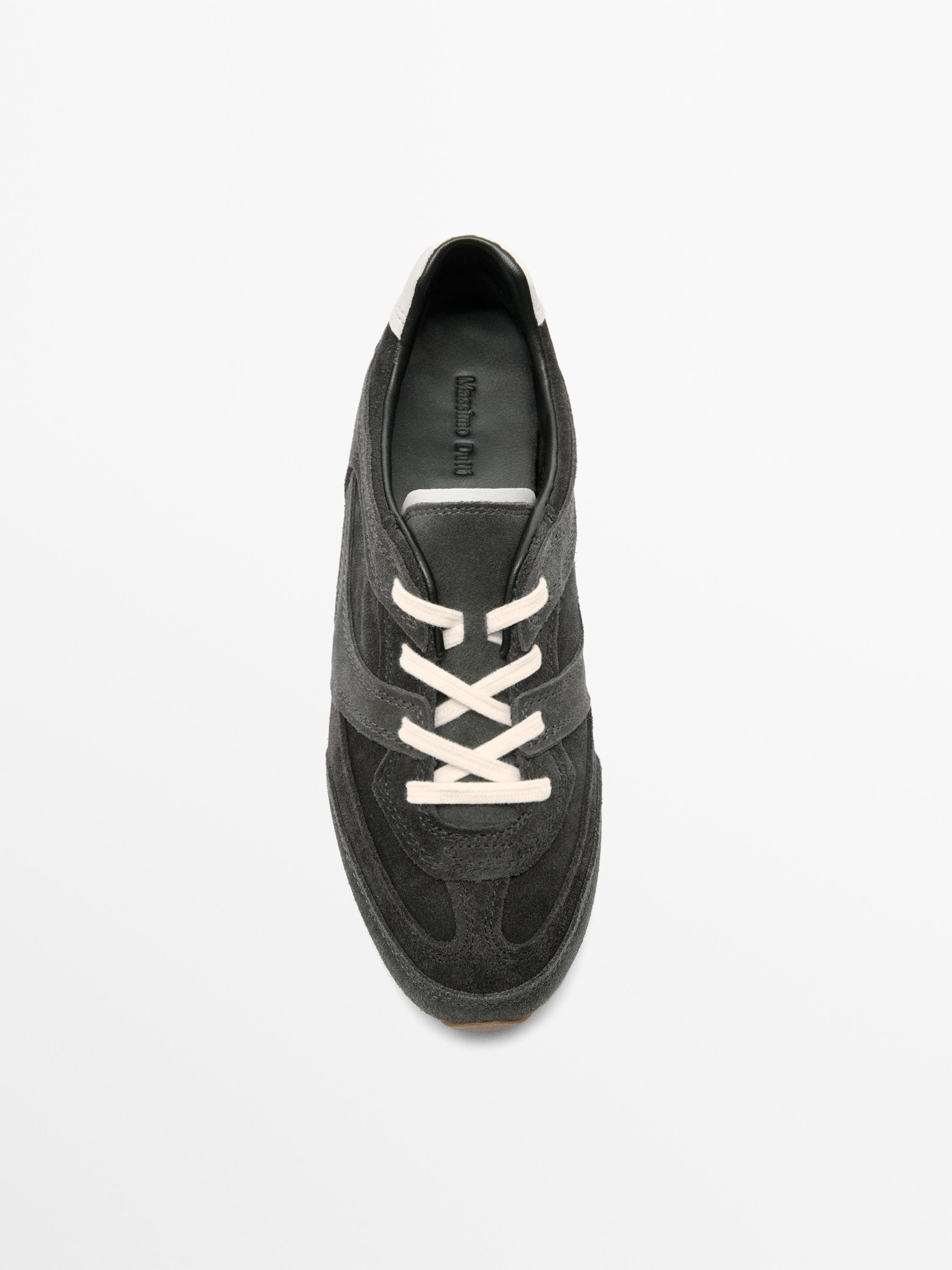 Tennis cuir contrastant